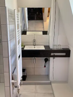 Salle de bains dans l'établissement Gîtes Openroc - Vue imprenable sur Colmar