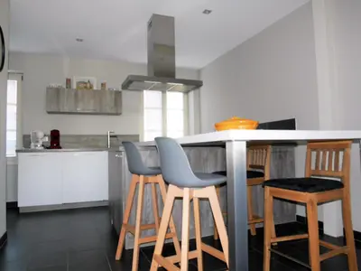 Cuisine ou kitchenette dans l'établissement Les gîtes de la Tour, appartement 