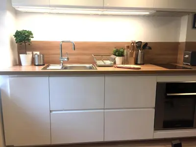 Cuisine ou kitchenette dans l'établissement Le STUDIO 1586 - Centre historique