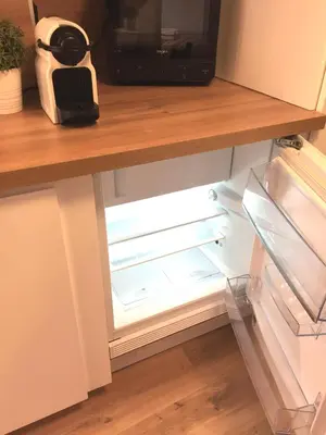 Cuisine ou kitchenette dans l'établissement Le STUDIO 1586 - Centre historique