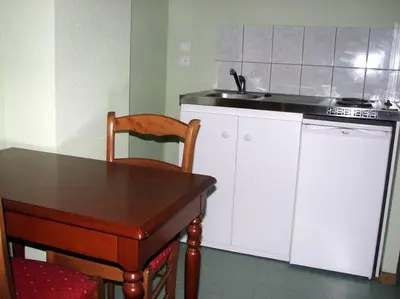 Cuisine ou kitchenette dans l'établissement Le Soleil