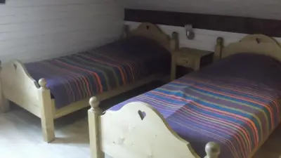 Un ou plusieurs lits dans un hébergement de l'établissement La Ferme du Vieux Sapin