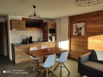 Cuisine ou kitchenette dans l'établissement LA BRESSE - Appartement de Charme