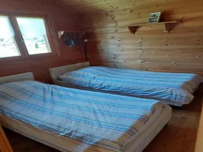 Un ou plusieurs lits dans un hébergement de l'établissement Chalet with Garden in Lotharingen