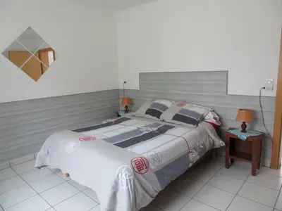 Un ou plusieurs lits dans un hébergement de l'établissement Maison bleue Petermann