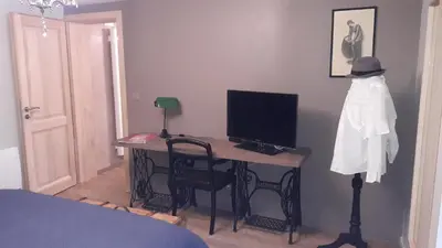 Télévision ou salle de divertissement dans l'établissement Au fil de l'écriture - Appartement sur la Route des Vins à riquewihr
