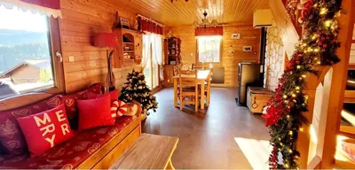Coin salon dans l'établissement Chalet de la Grimpette au coeur de Gérardmer