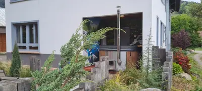Jardin de l'établissement Locations des 3 sommets avec Sauna et Spa en Alsace