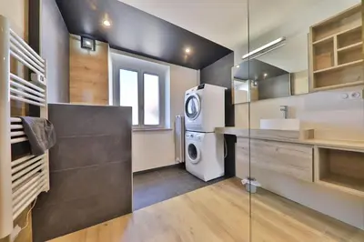 Cuisine ou kitchenette dans l'établissement Locations des 3 sommets avec Sauna et Spa en Alsace