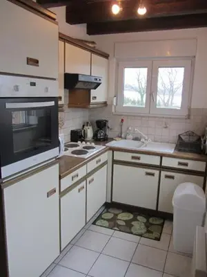 Cuisine ou kitchenette dans l'établissement Gite de Grandvillars