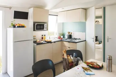 Cuisine ou kitchenette dans l'établissement Camping du canal