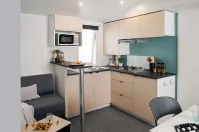Cuisine ou kitchenette dans l'établissement Camping du canal