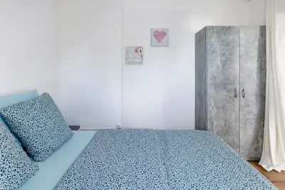 Un ou plusieurs lits dans un hébergement de l'établissement Comfort Stay Basel Airport 3B46