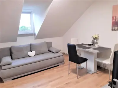Coin salon dans l'établissement Comfort Stay Basel Airport 3B46