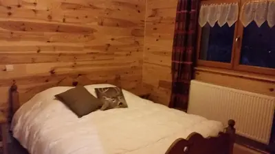 Un ou plusieurs lits dans un hébergement de l'établissement Chalet des Bruyères