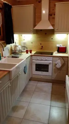 Cuisine ou kitchenette dans l'établissement Chalet des Bruyères