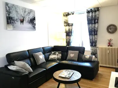Coin salon dans l'établissement Le Chamois