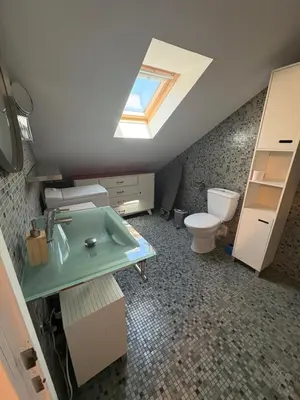 Salle de bains dans l'établissement L'ESCALE SELESTADIENNE