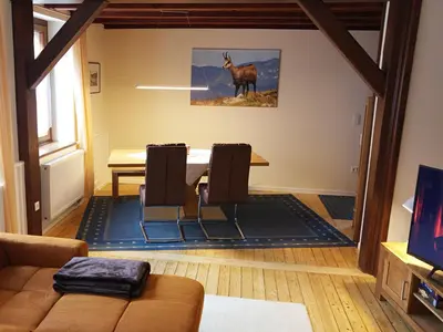 Coin salon dans l'établissement Le Chamois