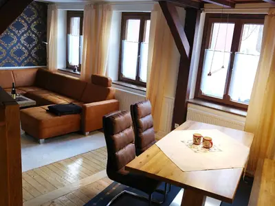 Coin salon dans l'établissement Le Chamois