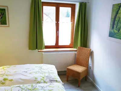 Un ou plusieurs lits dans un hébergement de l'établissement Le Chamois