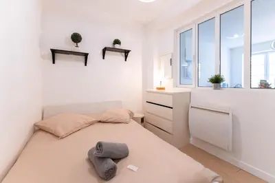 Un ou plusieurs lits dans un hébergement de l'établissement Colmar City Center - Modern Studio COCOON - BookingAlsace
