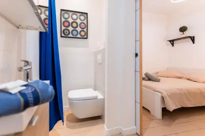 Un ou plusieurs lits dans un hébergement de l'établissement Colmar City Center - Modern Studio COCOON - BookingAlsace