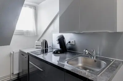 Cuisine ou kitchenette dans l'établissement MyHome Basel 3A44