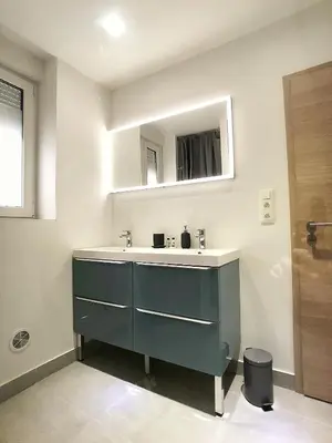 Salle de bains dans l'établissement Au p'tit Cordonnier