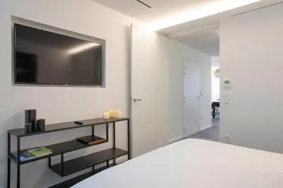 Un ou plusieurs lits dans un hébergement de l'établissement BORD EAU Guest House