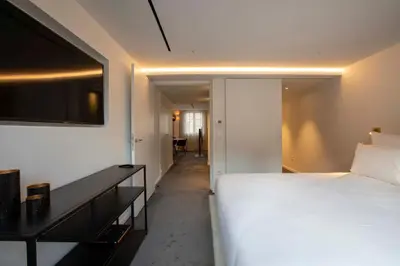 Un ou plusieurs lits dans un hébergement de l'établissement BORD EAU Guest House