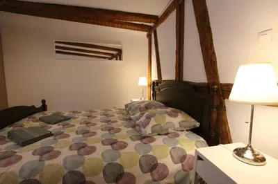 Un ou plusieurs lits dans un hébergement de l'établissement Colmar Historic Center - Alsacian Appartement PETITE VENISE 2 - BookingAlsace