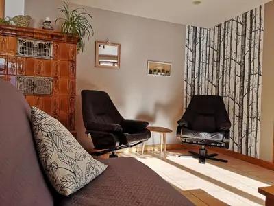 Coin salon dans l'établissement Gîte du Grand Pré