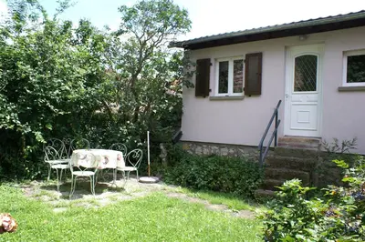 Jardin de l'établissement LA MAISON FLEURIE Gîtes du Florimont