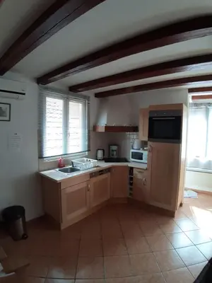 Cuisine ou kitchenette dans l'établissement LA MAISON FLEURIE Gîtes du Florimont