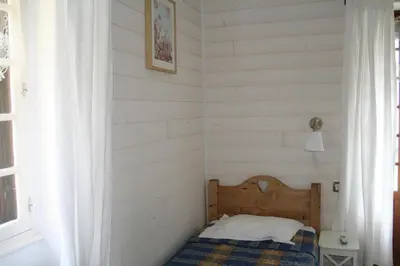 Un ou plusieurs lits dans un hébergement de l'établissement Auberge du Lac