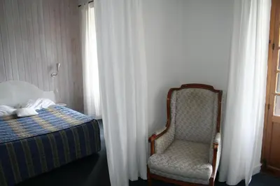 Un ou plusieurs lits dans un hébergement de l'établissement Auberge du Lac