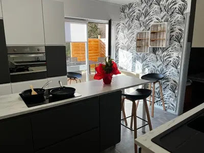 Cuisine ou kitchenette dans l'établissement Hôtel Le Riquewihr