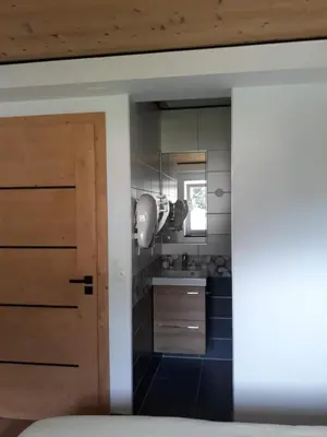 Cuisine ou kitchenette dans l'établissement La maison des savoyards