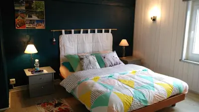 Un ou plusieurs lits dans un hébergement de l'établissement Chambre dans ancienne Ferme rénovée