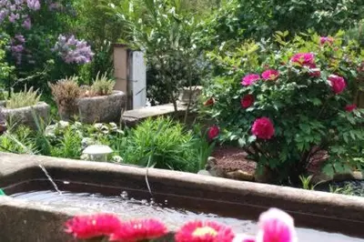 Jardin de l'établissement Chambre dans ancienne Ferme rénovée