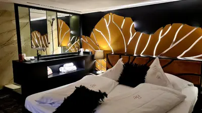 Un ou plusieurs lits dans un hébergement de l'établissement Domaine du Haut Jardin Hôtel & Chalets Spa Privé