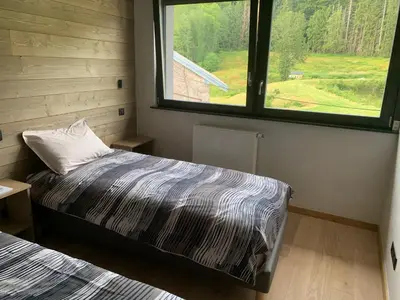 Un ou plusieurs lits dans un hébergement de l'établissement Gite grand standing dans cadre idyllique