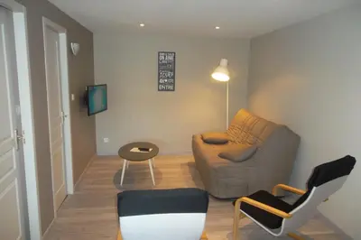 Télévision ou salle de divertissement dans l'établissement Appartement au centre du tholy pour 5 personnes maximum