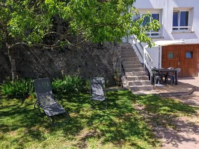 Jardin de l'établissement Appartement au centre du tholy pour 5 personnes maximum