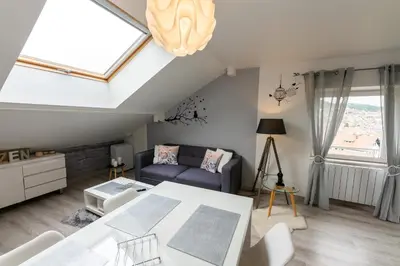 Un ou plusieurs lits dans un hébergement de l'établissement Gîte l'Améthyste 3 appartements