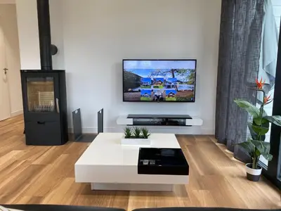 Télévision ou salle de divertissement dans l'établissement Chalet Manhattan