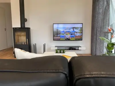 Télévision ou salle de divertissement dans l'établissement Chalet Manhattan