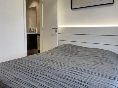 Un ou plusieurs lits dans un hébergement de l'établissement Chalet Manhattan