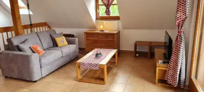 Coin salon dans l'établissement Maison d'Hôtes Sainte Hune Chambres et appartements